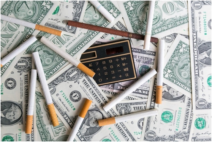 Cigarettes, money and a calculator