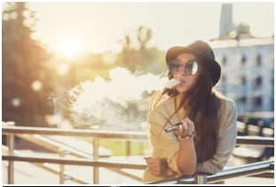 Woman vapes to quit smoking